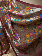 Paithani Brocade with All-Over Silver and Golden Zari, Multicolour Body, Flower Border, Contrast Muniya Border and Fancy Pallu